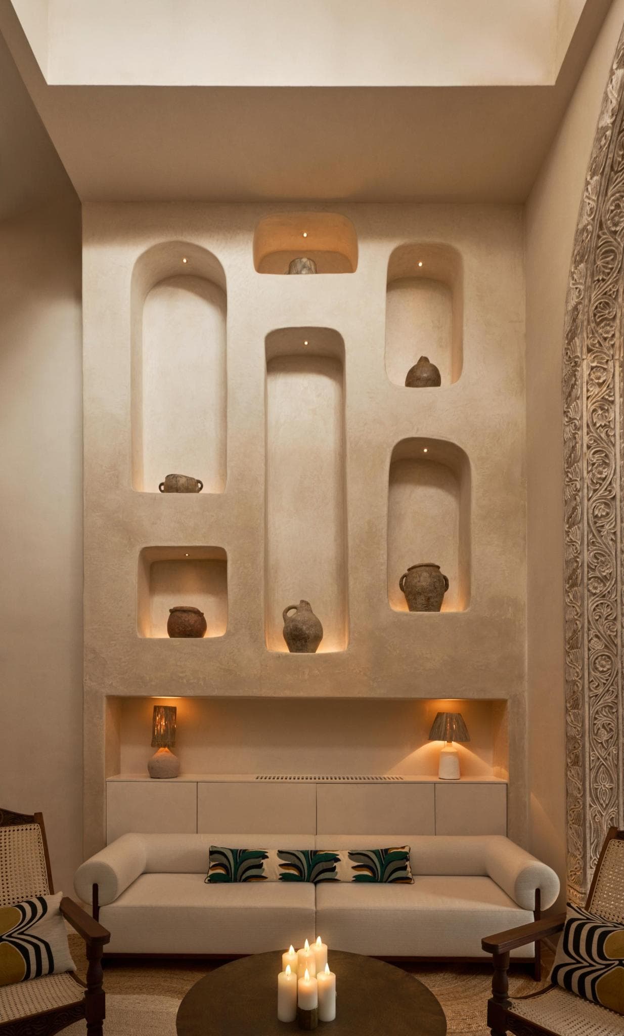 Warm interior with artisan pottery and candlelight